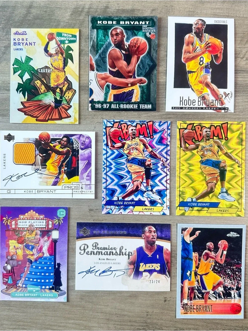 Kobe Bryant Signed Rookie Lot of (9) Kaboom Downtown Novelty Basketball Cards.